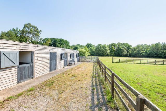This property has private equestrian facilities, including stabling and paddock grazing
