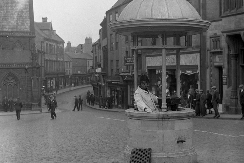 Who remembers the police box in the Market Place? And what about the Doggarts store which is pictured behind it?