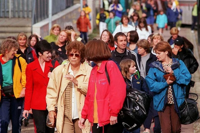 Spice Girl Fans make their way to the Don Valley Stadium for the Friday Night Concert in September 1998