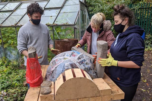 The group of creative young people making a community pizza oven at Norwood Allotments.