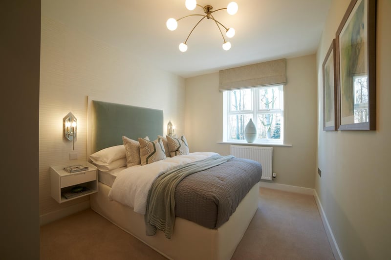 Lucy Simpson, of interior design firm Clayton & Company, which styled the Knightsbridge II show home, says: "Visualised as a guest bedroom, bedroom three features a blend of pastel greens and creams to give a peaceful, neutral tone. We’ve ensured this room remains classy with not too much going on, to avoid detracting from the lovely space it offers – although the quirky light and wall-mounted bedside table indeed add a contemporary touch.”