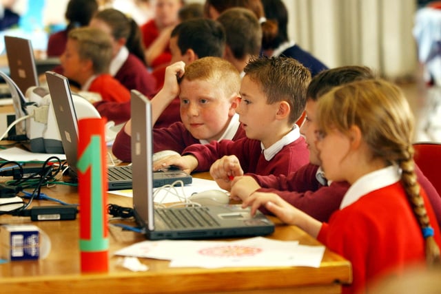 A school feeder day at English Martyrs and these children are having fun with computers. Recognise them?