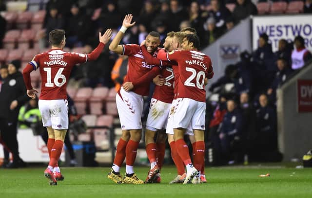 Middlesbrough players celebrate after scoring at Wigan.