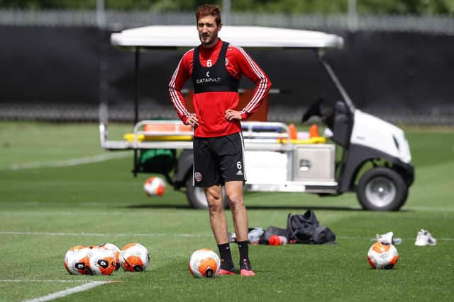 Sheffield United defender Chris Basham takes part in one of the Premier League club's first training sessions since he fixture programme was suspended because of Covid-19 Simon Bellis/Sportimage