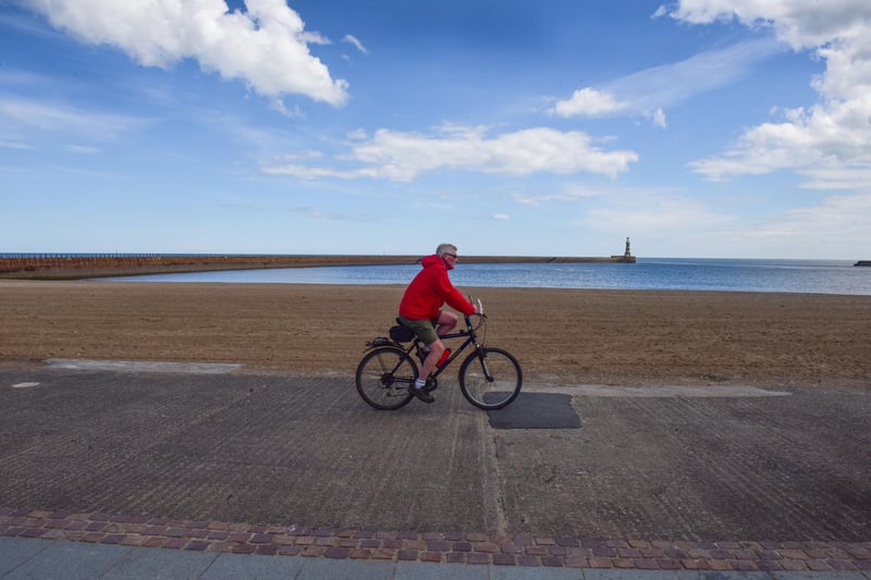 A cyclist by Roker Beach.