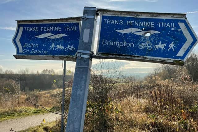 Trespassers with firearms blasted this hole in a sign on the Trans Pennine Trail in the Peak District near Sheffield, say police (pic: South Yorskhire Police Off Road Team)