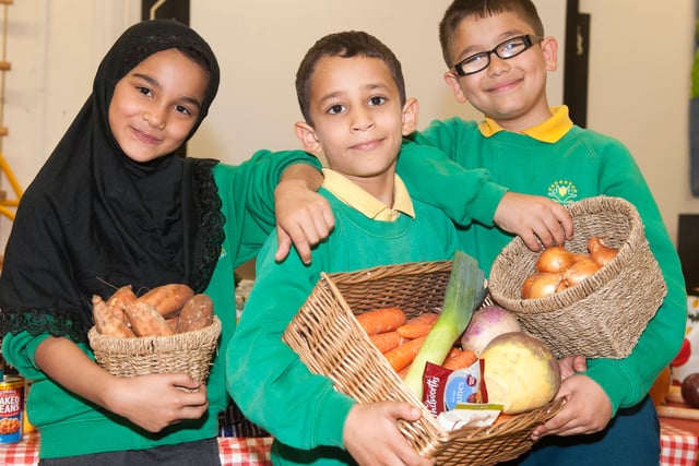 Pupils at Owler Brook School with their harvest Festival gatherings in 2015