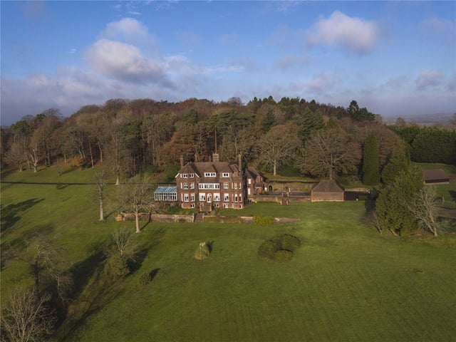 Set in around 30 acres of parkland, this country mansion is located in the village of Broad Oak within the High Weald Area of Outstanding Natural Beauty. As well as its extensive gardens, it has many characterful period features, including fireplaces, parquet flooring and decorative coving. Price: £3,500,000.