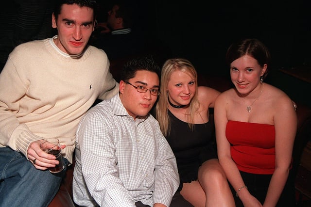 Clayton King, Bobby Arther, Sarah Minger and Hannah Miller,  enjoy the night after finishing University exams  in 2003