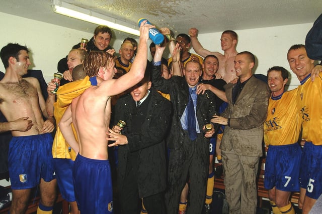 Dressing room celebrations as Stags head for Division Two.