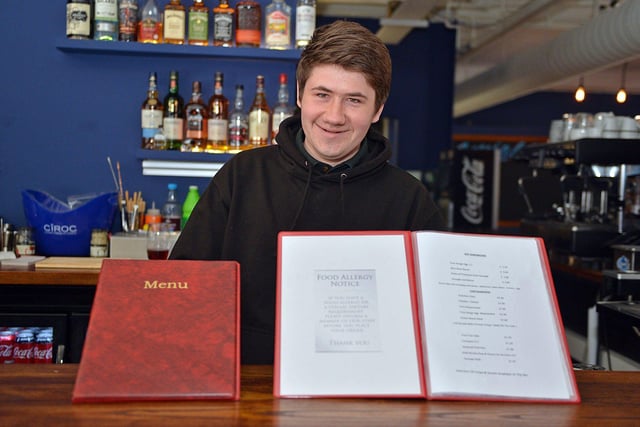 Ryan Booth with The TapHouse's initial menu.