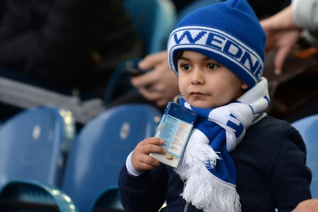 A young Owls fan watches his side in action.
