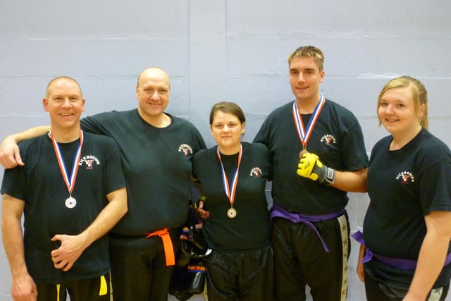 Hucknall's Glen Dolphin (fourth right) during his time with the 50Kickboxing team.