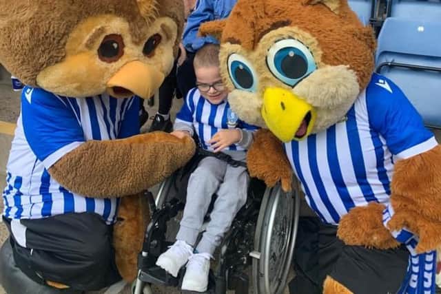 Fundraisers are contributing towards a new wheelchair for eight-year-old Sheffield Wednesday fan Owen Haslam.