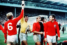 Gordon Banks on the pitch with Bobby Moor, Peter Thompson and Martin Peters after the World Cup victory