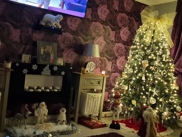 A gorgeous bow on top of Andie Robinson's tree.