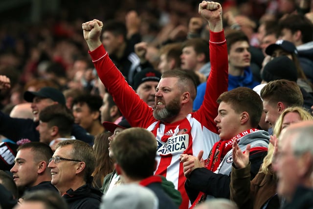 Sunderland supporters celebrate during the English Premier League football match against Everton at the Stadium of Light.