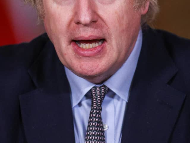 LONDON, ENGLAND - MARCH 23: Prime Minister Boris Johnson speaks during a press conference at 10 Downing Street