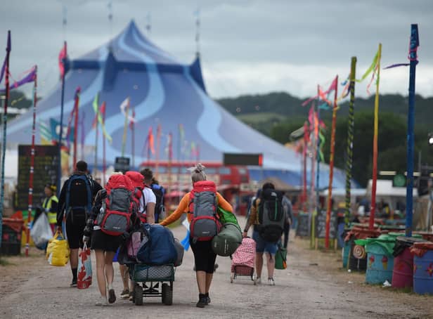 Here's everything you need to know about getting your hands on resale tickets for Glastonbury 2022. (Photo by OLI SCARFF/AFP via Getty Images)