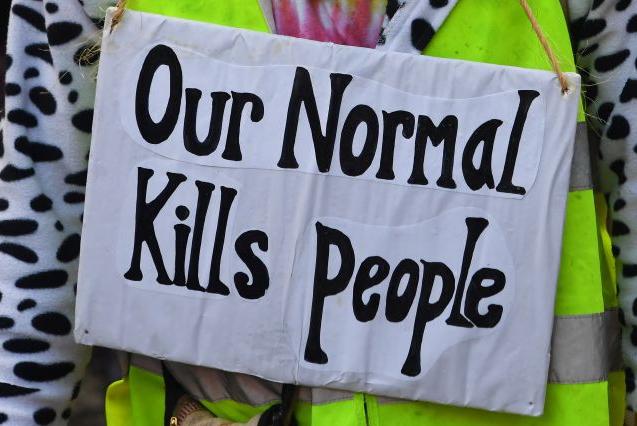 An Extinction Rebellion protestor opted for this simple but shocking message (Getty Images)