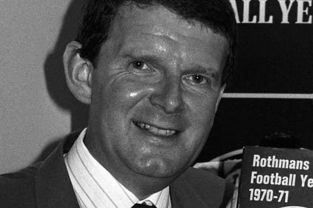 Former Sheffield Telegraph reporter and BBC Match of the Day football commentator with a copy of his prized Rothmans football compendium during his younger days. Picture courtesy of PA Images/PA Wire.