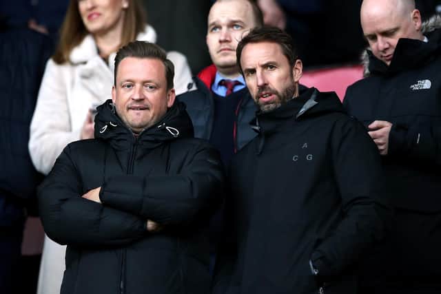 England manager Gareth Southgate (right) in the stands during the Premier League match between Sheffield United and Brighton at Bramall Lane, Sheffield Tim Goode/PA Wire.