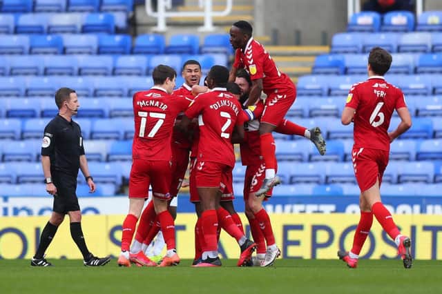 Marc Bola of Middlesbrough celebrates with teammates after scoring his team's second goal against Reading.