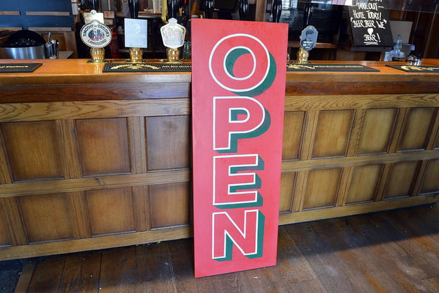 A new 'open' sign created by a local artist for the Chesterfield Arms.