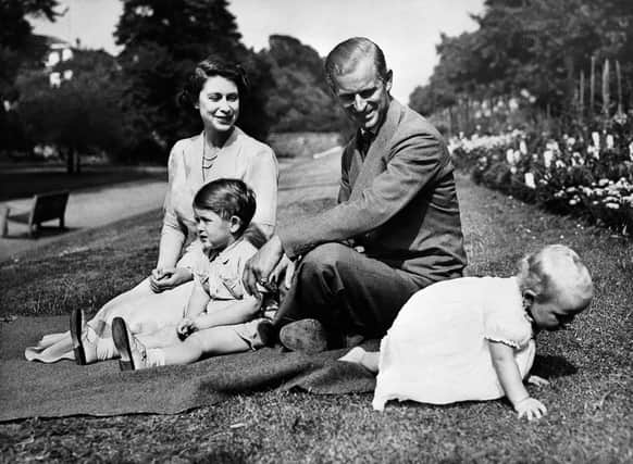 Queen Elizabeth and the Duke of Edinburgh with their two children Prince Charles and Princess Anne in 1951. (Photo: OFF/AFP/ Getty Images)