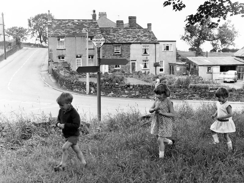 Children playing on the village green at Thurgoland, near Sheffield, July 9, 1968