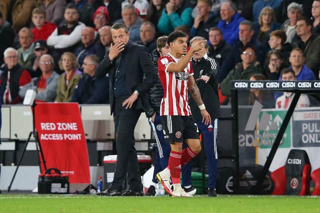 Morgan Gibbs-White of Sheffield United walks past manager Slavisa Jokanovic after being sent off during the Sky Bet Championship match between Sheffield United and Millwall at Bramall Lane. (Photo by Alex Livesey/Getty Images)