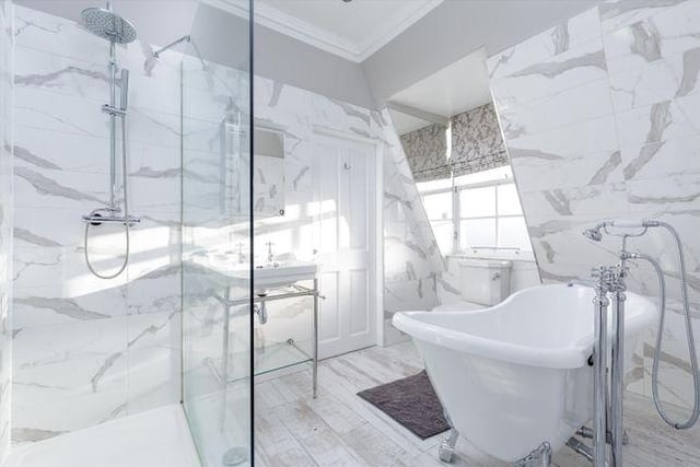 All the bedrooms have these bright and modern en suite bathrooms.