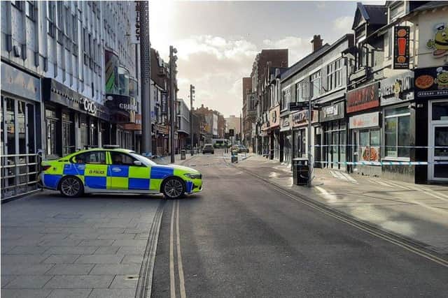 A huge police cordon has been thrown up around the crime scene with a number of streets sealed off.