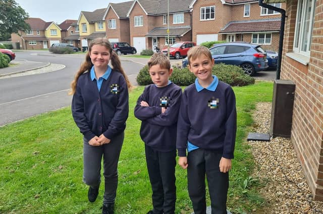 Parents from across the Portsmouth area shared photos as their children returned to school after the summer holiday on Thursday, September 2, 2021. Pictured is Gracie, aged nine, Lee Jr, and Micky, aged eight.