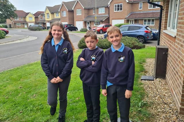 Parents from across the Portsmouth area shared photos as their children returned to school after the summer holiday on Thursday, September 2, 2021. Pictured is Gracie, aged nine, Lee Jr, and Micky, aged eight. 