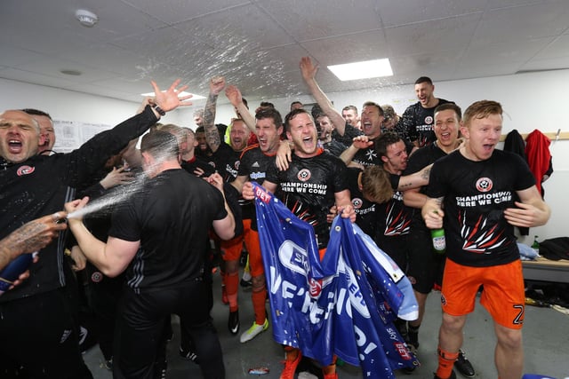 Sheffield United's players celebrate promotion during the League One match at the Sixfields Stadium, Northampton. Picture date: April 8th, 2017. Pic Simon Bellis/Sportimage 