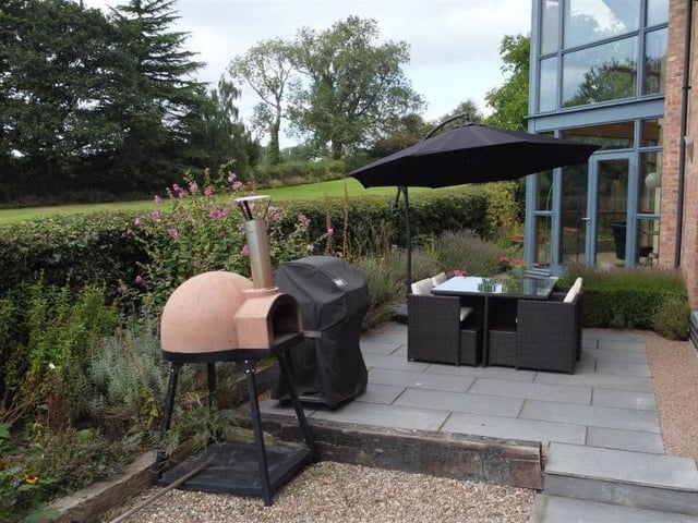 A close-up view of the patio area. An ideal space for a barbecue or a relaxing summer's evening with family and friends.
