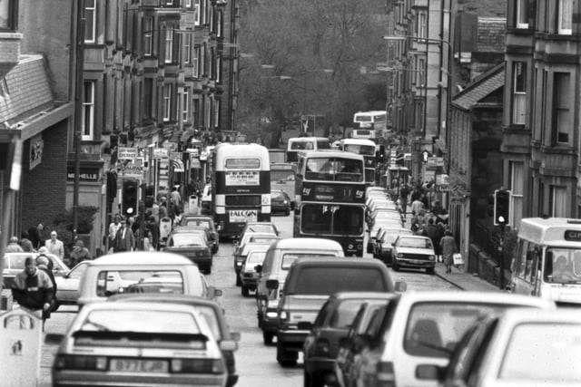 Cars and buses create traffic problems in Morningside Road Edinburgh, January 1990.