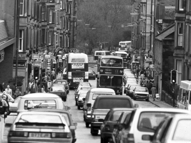 Cars and buses create traffic problems in Morningside Road Edinburgh, January 1990.
