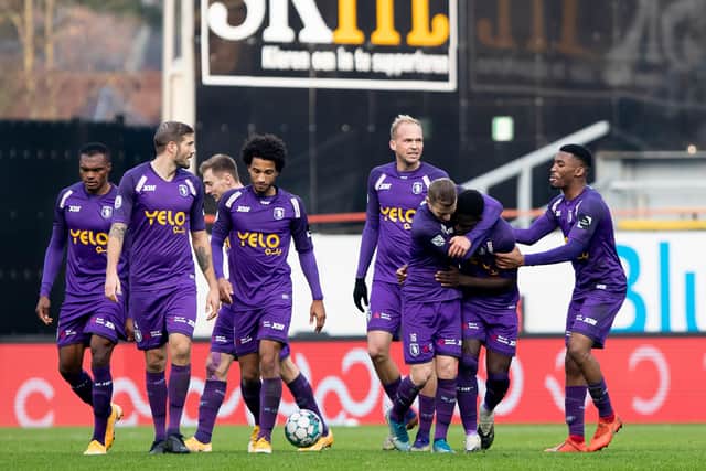 Beerschot's Isamaila Cheikh Coulibaly celebrates with teammates after scoring during a match against KV Mechelen: KRISTOF VAN ACCOM/BELGA MAG/AFP via Getty Images