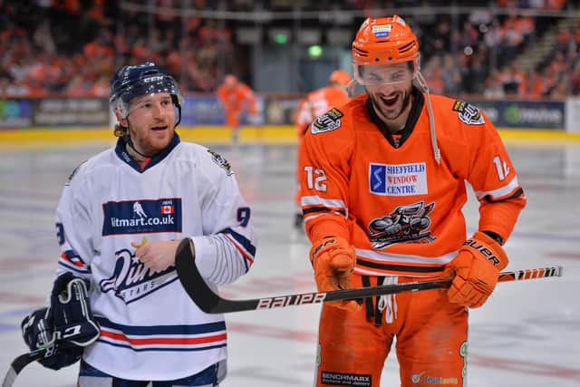 Charlie Combs shares a joke with Steeler Justin Hodgman. Picture: Dean Woolley