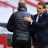 Chris Wilder, manager of Sheffield United shakes hands with Scott Parker, manager of Fulham following the Premier League match (Photo by Gareth Copley/Getty Images)