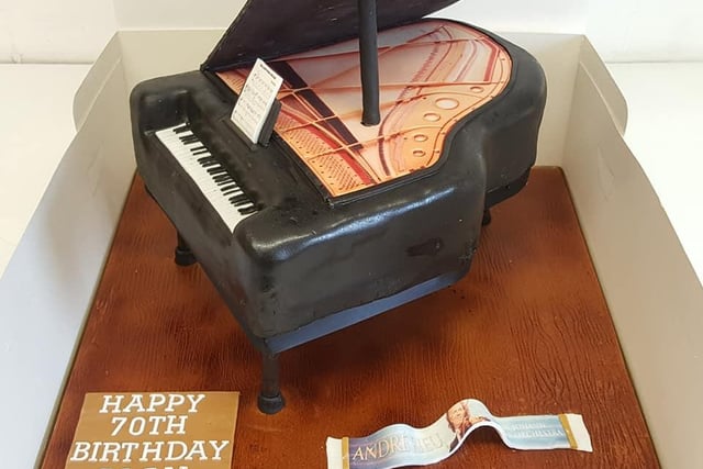 How about this cake in the shape of a grand piano.