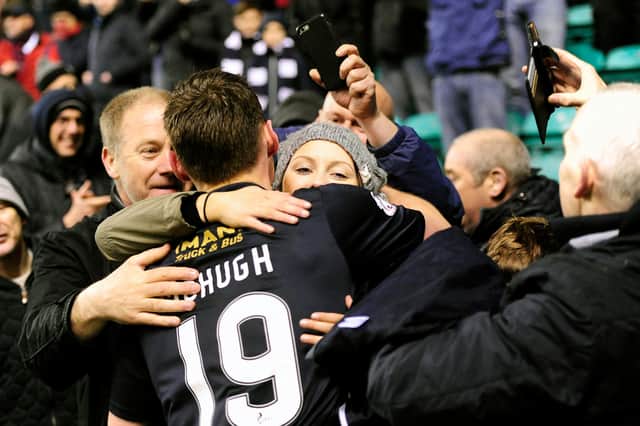 12-04-2016. Picture Michael Gillen. EDINBURGH. Easter Road Stadium. Hibernian FC v Falkirk FC. SPFL Championship. Bob McHugh 19 celebrates at the end of the game with girl friend and dad (right).