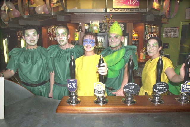 Wetherspoons Bar, Cambridge Street, Sheffield, where staff were dressed as Fairies and Pixies for the 2001 beer festival. Seen LtoR are,  Daniel Wong, Eugene O'Callaghan, Emma  Parkinson, Craig Kitchen, and Claire Price.