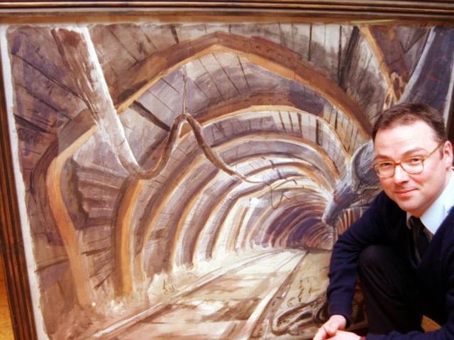 Exhibition 'facing coal' at the Doncaster Museum in 1988. Artist is James Bartholomew. Attendent photographed is Neil Gregor.
