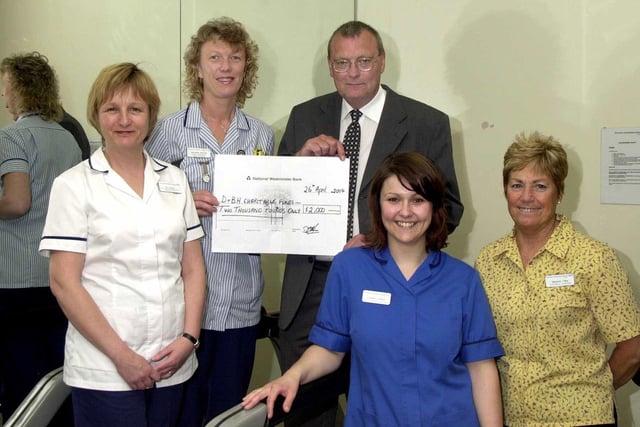 In 2004 a donation of £2000 was made by the Alverley Inn, Balby, for the cardiac rehabilitation programmes at Doncaster Royal Infirmary and Montagu Hospital. Pictured (from left) are: Ann Naylor, Cardiac Rehabilitation Physiotherapist; Michelle Barrett, Cardiac Rehabilitation Nurse; Dave Allen, Landlord, Alverley Inn; Lauren Ludlow, Cardiac Rehabilitation Physiotherapy Assistant; and Marjorie Tilley, Cardiac Rehabilitation Volunteer.
