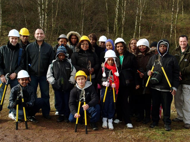 Members of the Sheffield Black and Ethnic Minority Enviromental Network took part in a project to encourage more people from ethnic minorities to enjoy open spaces. They helped with clearing woodland at Kiveton Park to allow wild flowers to grow, with tuition from the Forestry Commisions Dougie MacTaggart in 2009