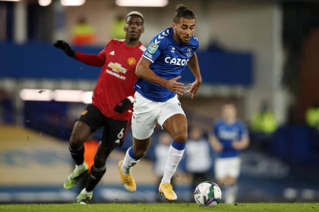 Dominic Calvert-Lewin of Everton runs past Paul Pogba of Manchester United (Photo by Clive Brunskill/Getty Images)