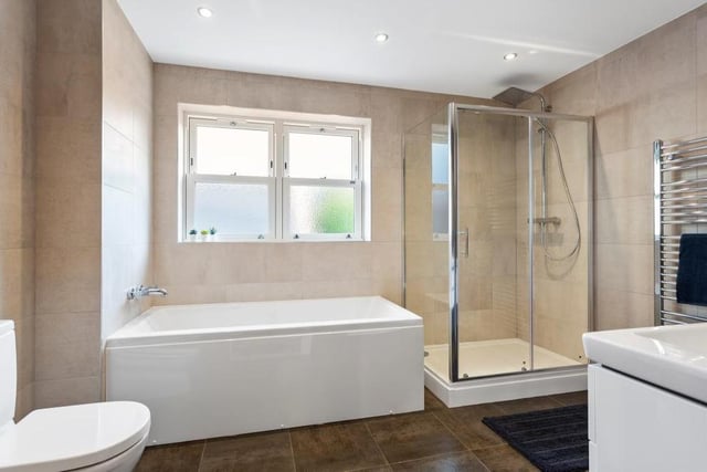 Villeroy and Boch products feature in all the bathrooms dotted around the house. This one features a shower cubicle, bath, low-flush WC and wash hand basin with vanity unit.